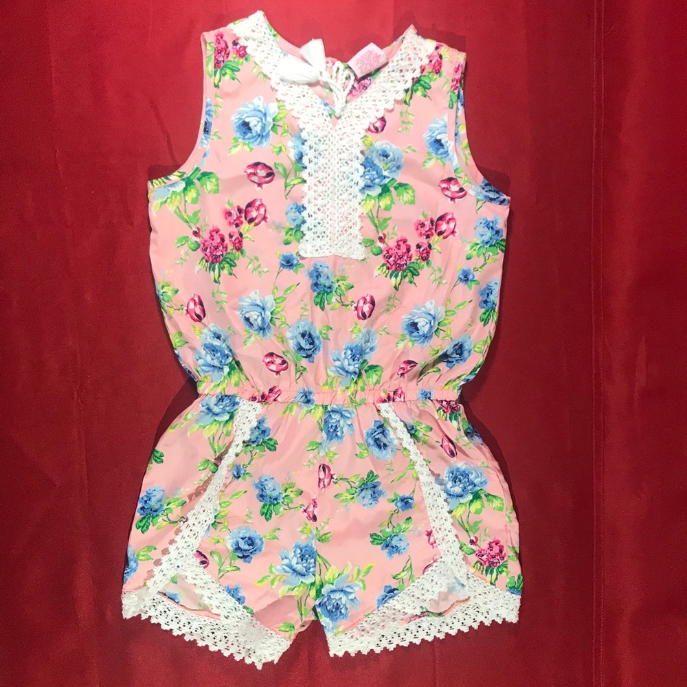 Girls size 10/12 Red love romper 100% polyester.